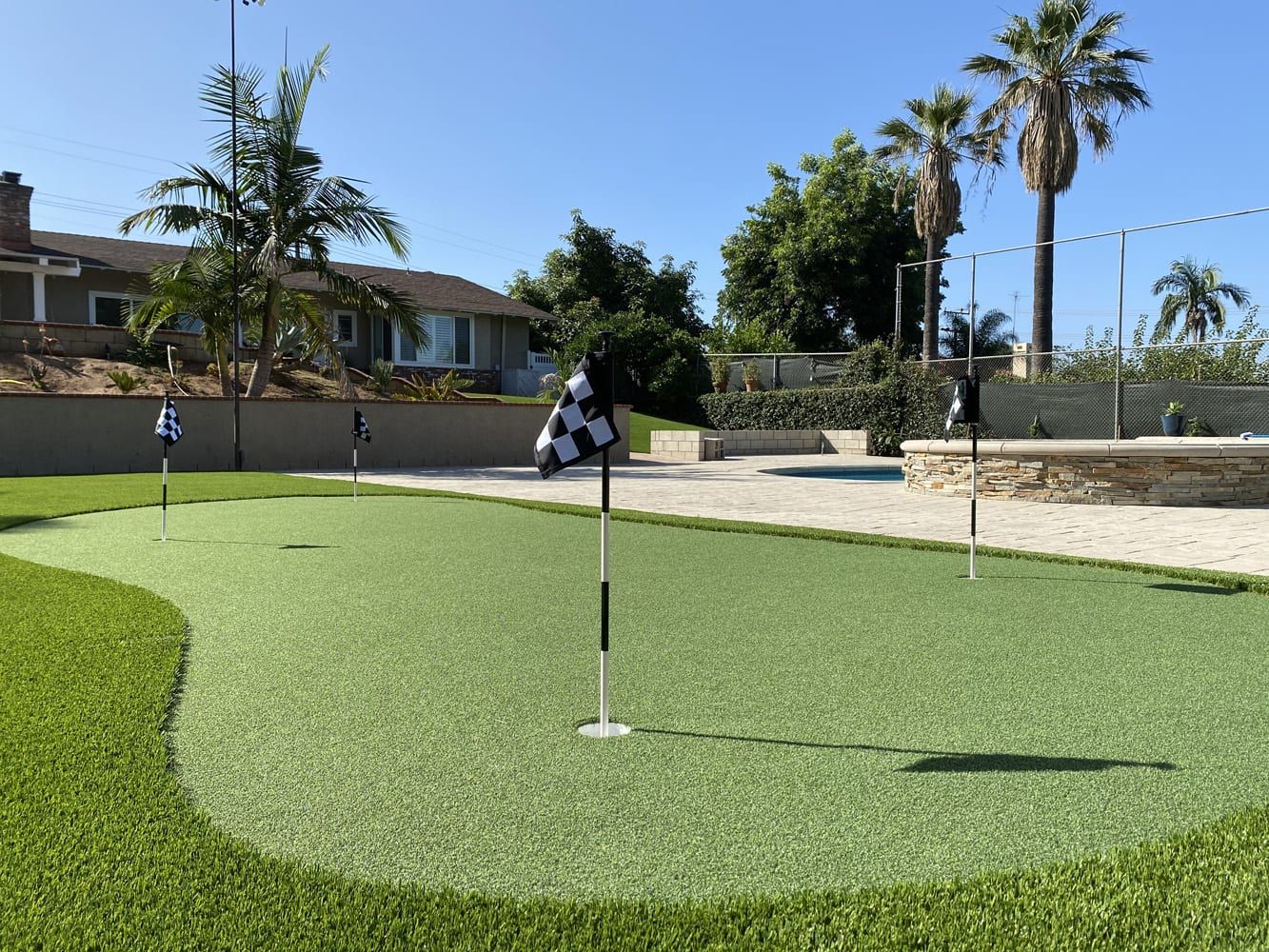 Backyard putting green installed by Always Green